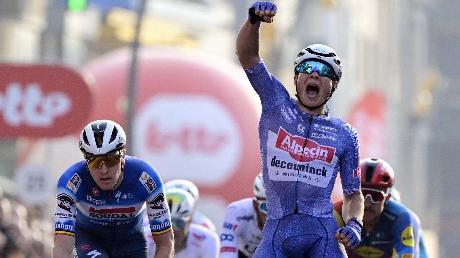 Belgian Jasper Philipsen of Alpecin-Deceuninck celebrates after winning the 'Classic Brugge-De Panne' men's elite one-day cycling race, 198,9 km from Brugge to De Panne, Wednesday 20 March 2024. BELGA PHOTO DIRK WAEM